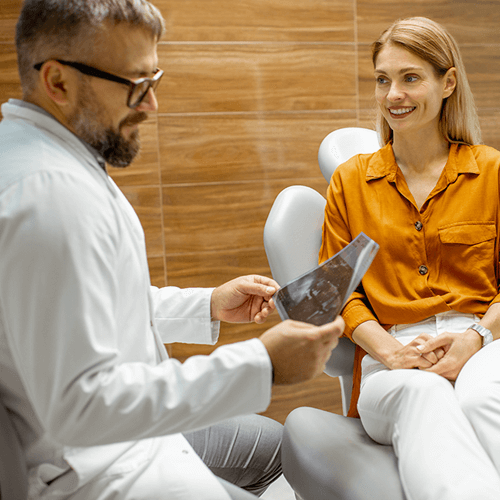 Dentist with patient